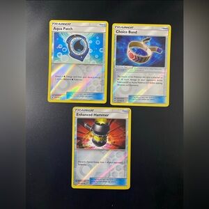 119/145 Aqua Patch 121/145 Choice Band 124/145 Enhanced Hammer Trainer Cards